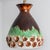 Stunning round hanging lamp with an unusual egg-like shape, made with rich colored green and brown ceramics, manufactured...