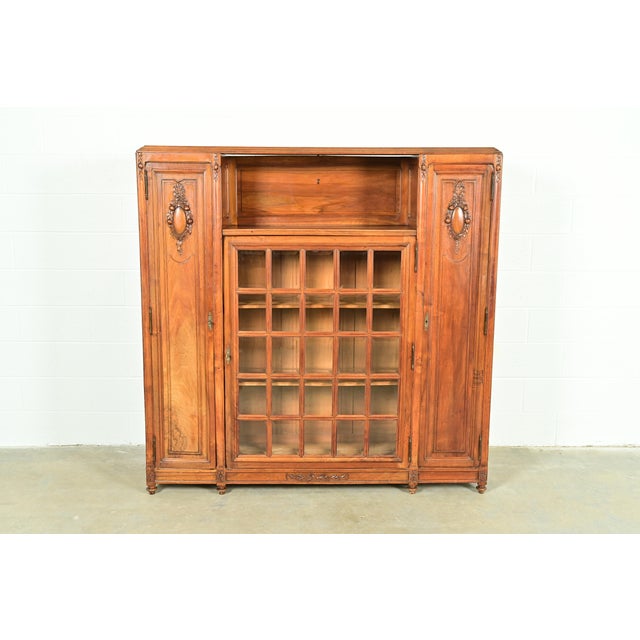 A beautiful antique French Art Nouveau bibliotheque bookcase cabinet In the manner of Louis Majorelle France, Circa 1900...