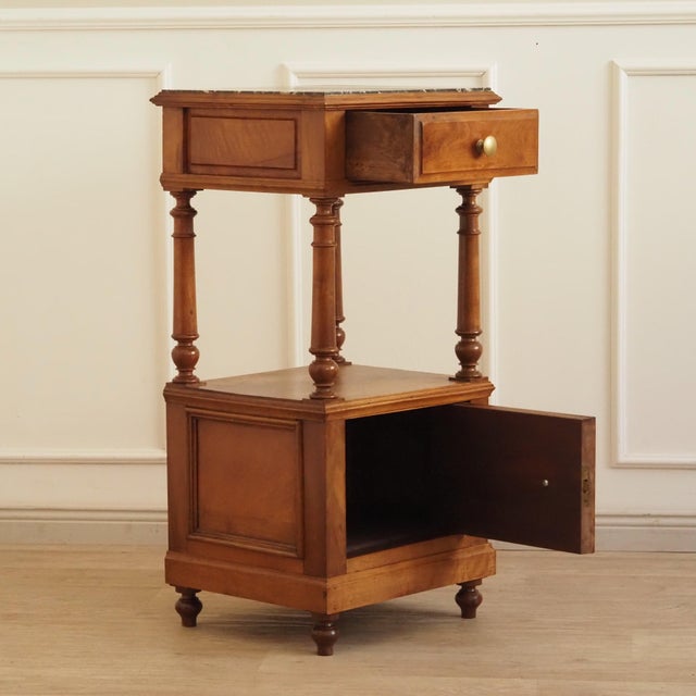 A two-part bedside table from the last quarter of the 19th century, its form and construction reflecting Historicism with...