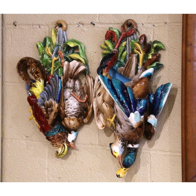 Full of color, movement and rustic French character, this striking pair of antique wall pockets is modeled with elaborate...
