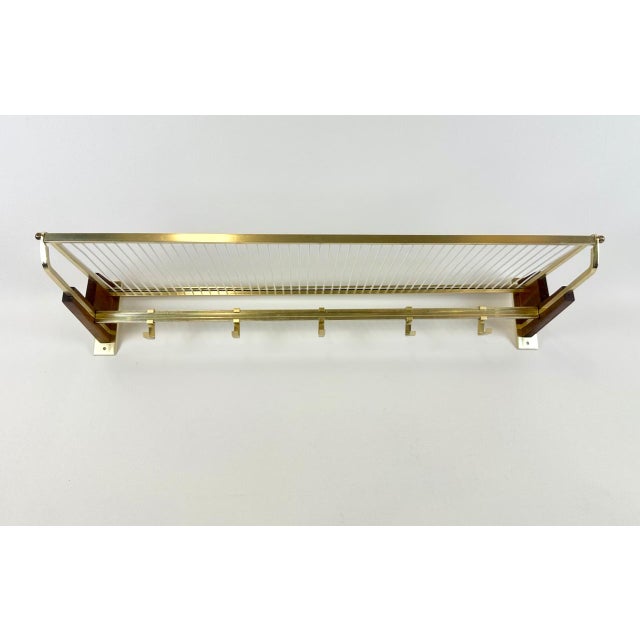 Mid-Century Teak and Brass Plated Coat Rack, 1960s, in Restored conditions. Designed 1960 to 1969