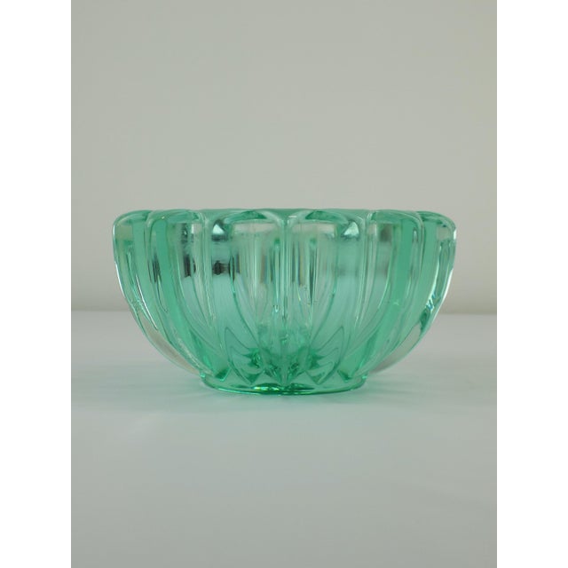 Art Deco Bowl in Green Moulded Glass by Pierre D'Avesn, 1940, in Flawless conditions. Designed 1920 to 1949 This piece is...