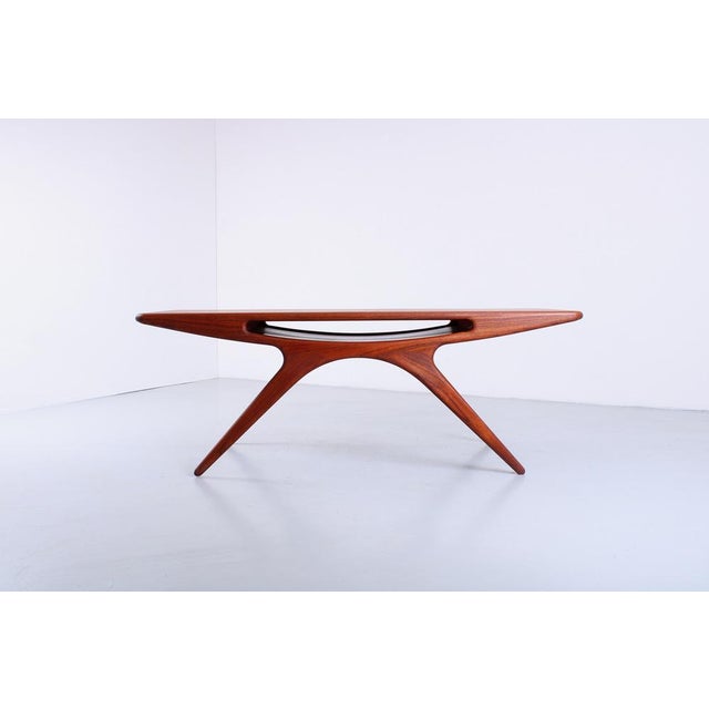 Danish Design icon, the 'Smile' coffee table by C.F. Christensen Møbelfabrik Silkeborg, design Johannes Andersen. This...