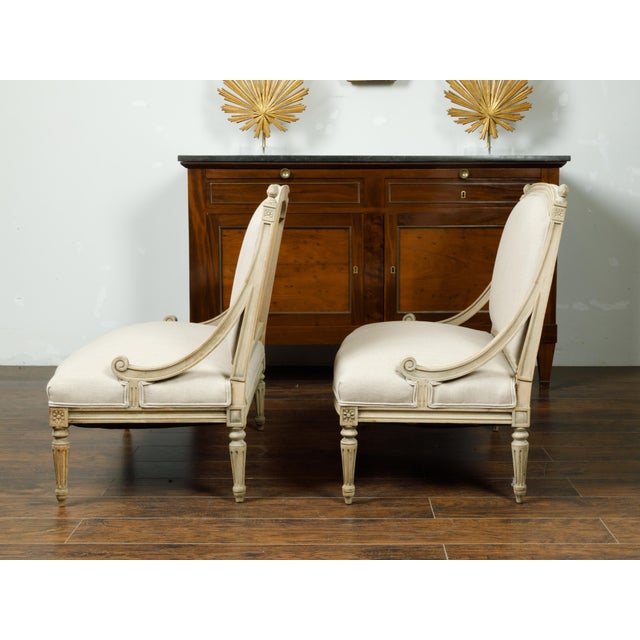 Wood Pair of French 1900s Louis XVI Style Walnut Settees with Scrolling Arm Supports For Sale - Image 7 of 8