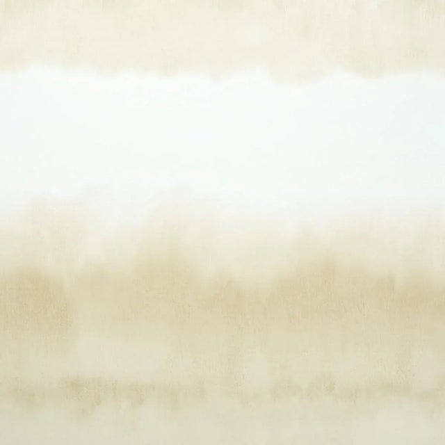 Capturing the look of artisanal processes like ikat or shibori, this 12-foot tall panel wallcovering has a soft,...