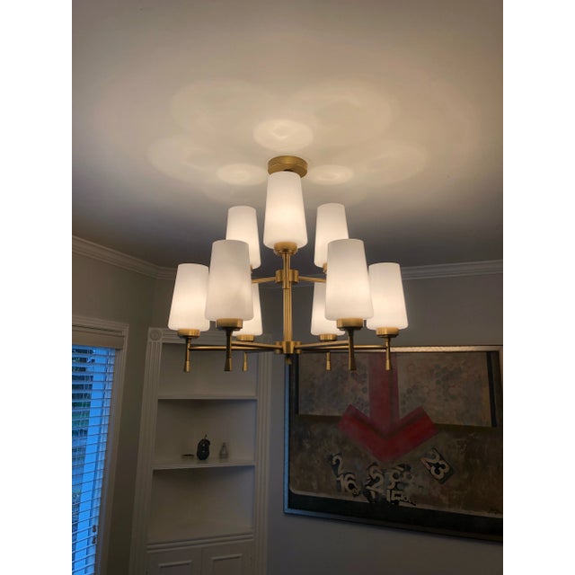 Arteriors Sigmund 9 Light 28" Wide Chandelier Sleek and modern The Sigmund chandelier slender profile is composed of solid...