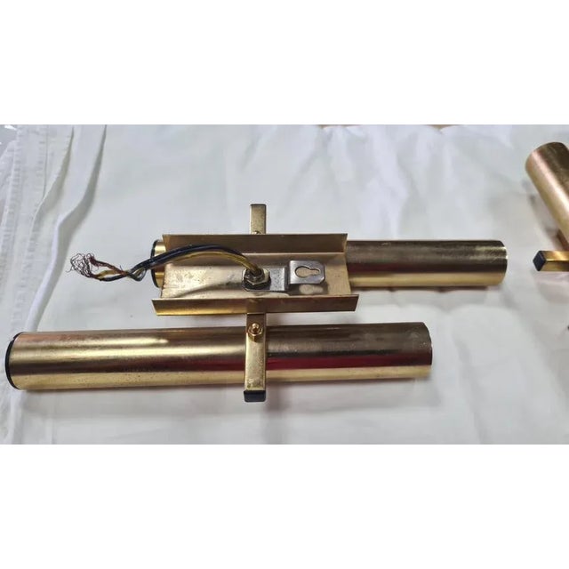 Pair of Sciolari wall lights, Italian production from 1970. Up to 250V (Europe/UK Standard).The wiring of this item may be...