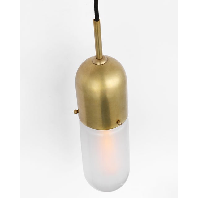 Junio Wall Light in Hand-Rubbed Antique Brass with Clear Glass Designer: Thomas O'Brien Finish: Hand-Rubbed Antique Brass...