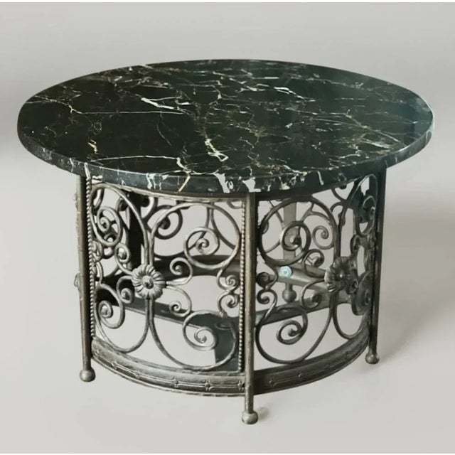 French art deco wrought iron garden table with black marble top, c. 1930s. Wonderful table with a black marble top with...