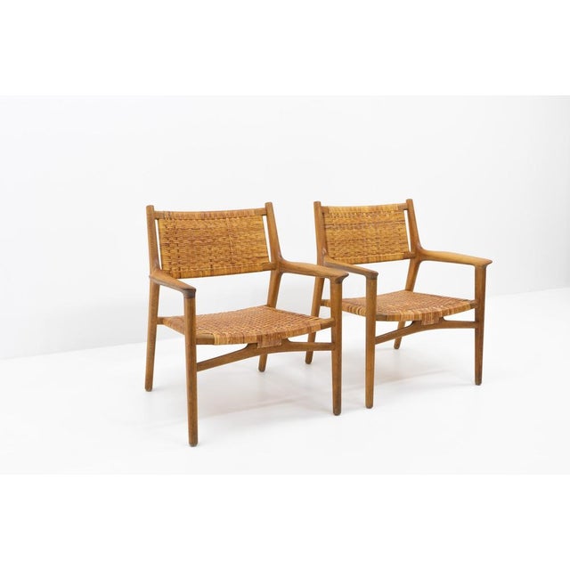 Labelled on underside of one chair. Condition: Very good as per images. Signs of use on the wood, we found a superficial...