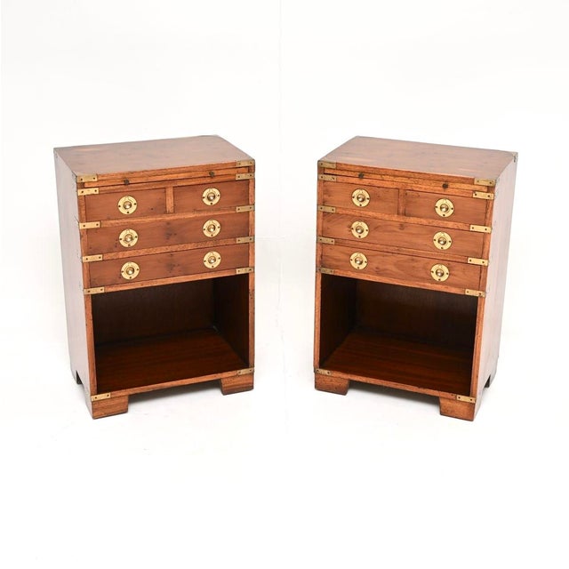 A smart and extremely well made pair of antique yew wood military campaign bedside cabinets / side tables. They were made...