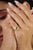 This pinky dome ring showcases a 0.61 carat natural heart-cut emerald set in a 14K yellow gold. The emerald measuring 3.5...