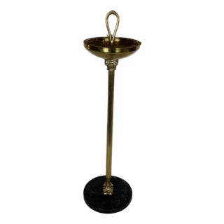 Neoclassical style bronze and brass ashtray on a circular black marble base For Sale