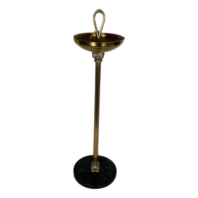 Neoclassical style bronze and brass ashtray on a circular black marble base For Sale