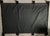 A vintage decorative wall hanging of painted velvet or velveteen. The piece depicts a romantic landscape with a...