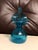Add a striking pop of mid-century sculptured elegance to your space with this vintage hand-blown art glass vase. Crafted...
