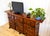 An attractive and impressive Spanish solid walnut sideboard-credenza in lovely vintage condition. Crafted in Spain around...