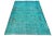 This vintage overdyed Persian wool rug features a captivating turquoise field with charming gray floral accents.s. This...