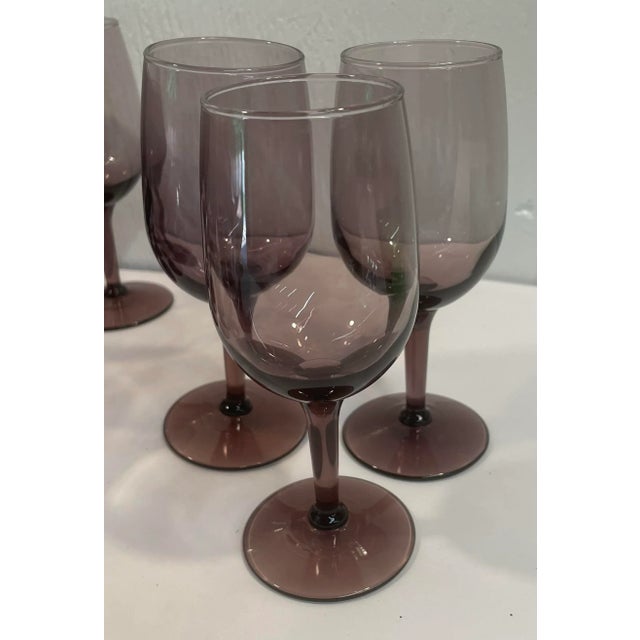 Beautiful amethyst wine glasses and a set of 24!