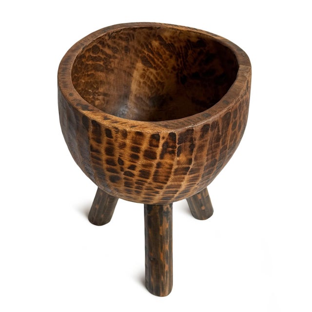 Vintage hand carved wooden bowl on three tall legs. Unique piece for display on its own or filled with items of your...