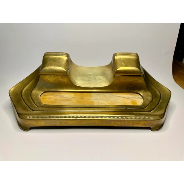 Whether you need a desk accessory or a catchall for your entryway, this striking Art Deco piece would be a perfect fit....