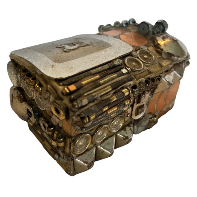 Wooden box embellished with found objects. By Brazilian Sculptor Francisco Möller. This piece is unmarked and was...