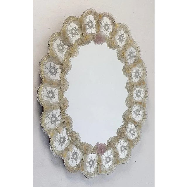 Oval Venetian mirror, made in beautiful clear and pale yellow Murano glass which is hand engraved. Made in the traditional...