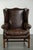 This comfortable and characterful wing armchair is made of cowhide leather and has a luxurious look. It is finished with...