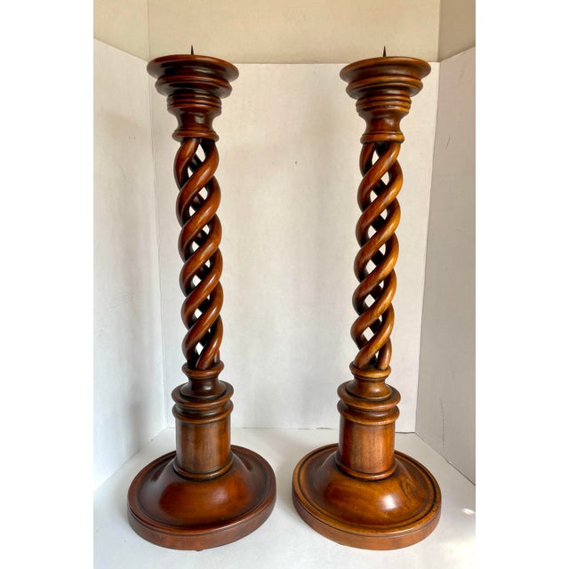 Here is a beautifully crafted pair of vintage candlesticks by Theodore Alexander, made in the late 20th century and...