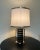 Up for sale is a gorgeous hexagonal shaped Italian lucite lamp. Black and gold stripe in the body of the lamp give it the...