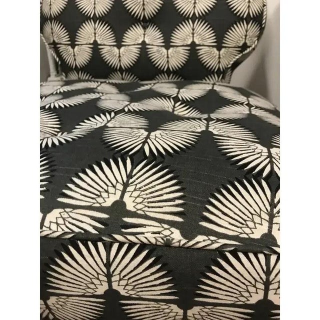 Fantastic pair of shapely vintage 1980s mid century slipper chairs. Black wood legs and shapely in form. Newly upholstered...