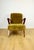 Vintage loft armchair in khaki/olive colour with long hair, fox style. Renewed armchair. A vintage 1970s armchair...