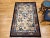 This vintage Chinese Art Deco area rug is a beautifully woven tapestry of symbolism, elegance, and cultural heritage....