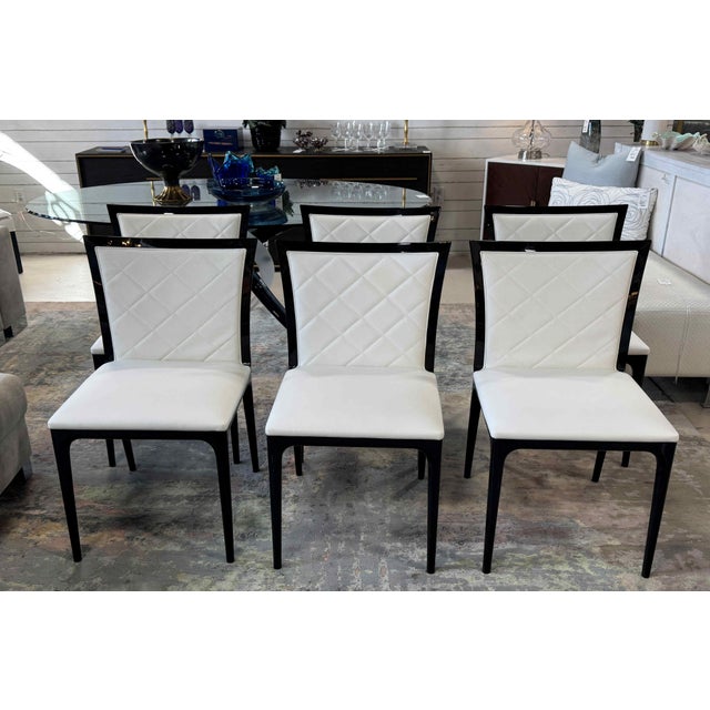 Set of 6 Costantini Pietro Four Seasons Dining Chairs. Features an ebonized and lacquered exposed wood frame with white...