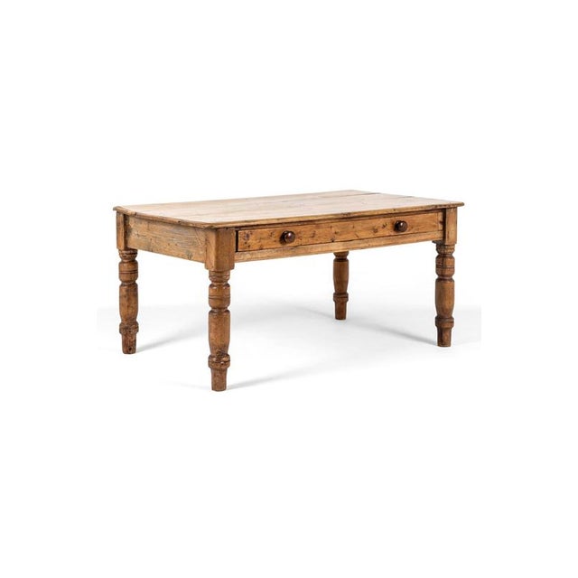 A substantial deep and wide welsh farmhouse table with an unusually long frieze drawer. The smooth running drawer is...