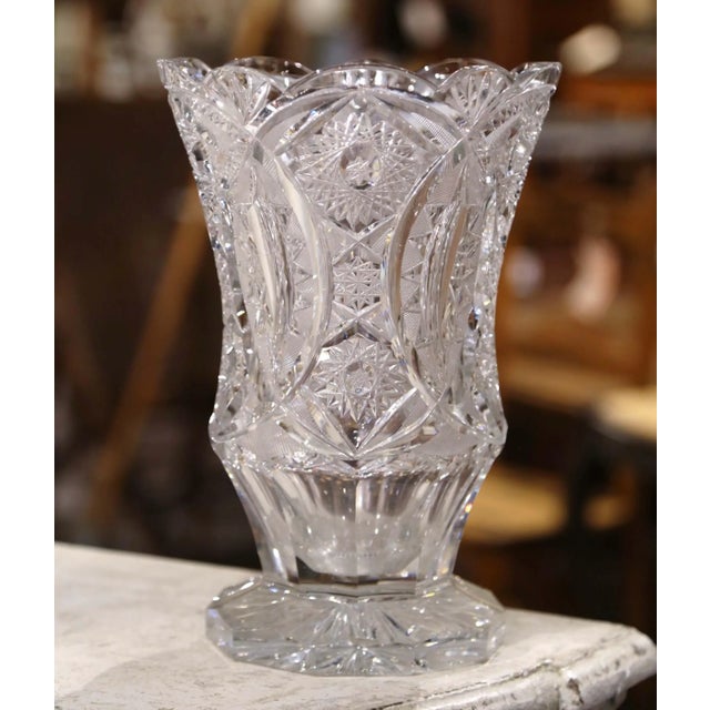 This elegant antique cut-crystal vase offers substantial proportions and brilliant decorative detail. Crafted in France...