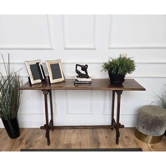 Beautiful Italian rustic country wooden console table, with trestle style legs in original aged natural color giving the...
