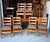 Sturdy Mission style dining chairs are constructed from quarter-sawn oak with a warm honey finish. Each chair has a 3 slat...