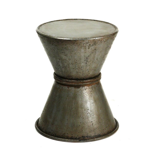 The Iron Stool from Zentique is an industrial backless stool in rustic zinc-finished iron with a round seat. The raw,...