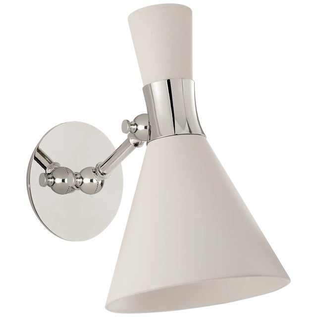 Liam Small Articulating Sconce in Polished Nickel with Matte White Shade Height: 11" Extension: 10.5" Backplate: 4.75"...