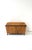 A tiger‑burl‑esque jewelry or decorative storage box in the Neoclassical Empire Revival style, circa late 20th century....