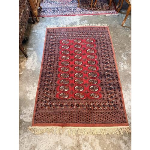 Beautiful vintage Bokhara hand-knotted Pakistani rug. Measuring 128 x 188 cm, this piece features fine knotting, vibrant...