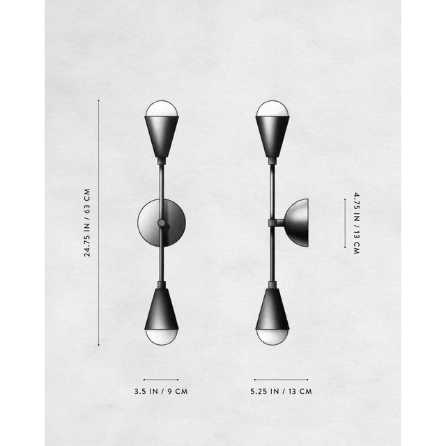 Apparatus Triad Sconce in Aged Brass. This fixture is so versatile! 24.75 H 3.5 W 5.25 D IN 63 H 9 W 13 D CM WEIGHT :...