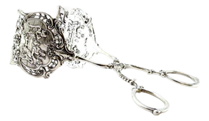 Silver Tongs with Raised Cutouts Shells and Pearly Stems