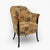 This armchair is made of solid lacquered beech and has polished Pau Ferro armrests. The seat and backrest padding is made...