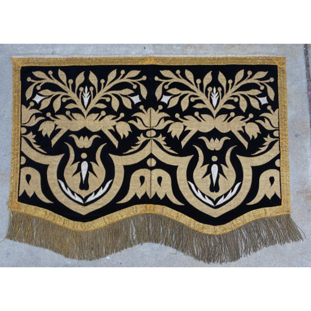 19th Century Italian Wall Hanging. Floral tulip design on black velvet background. Gold metallic tape and long fringe detail.