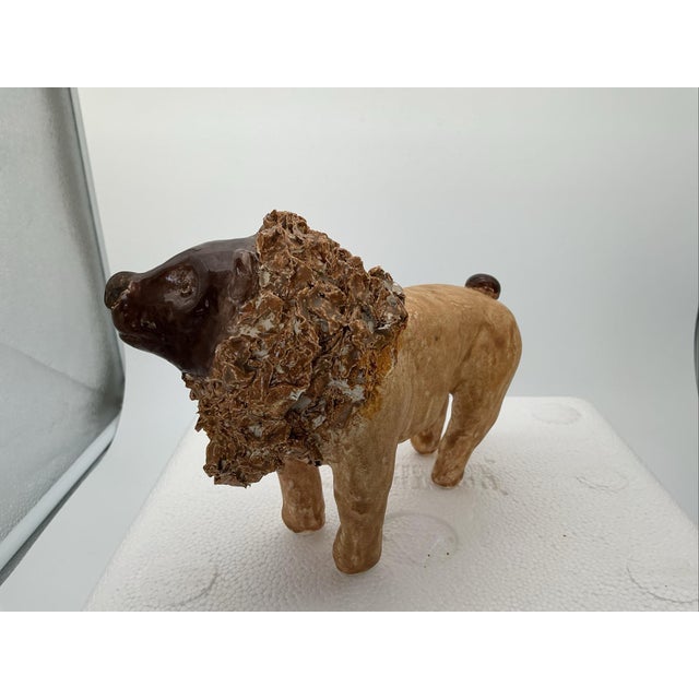 An expressive and wonderfully whimsical lion sculpture by Georgia folk artists Tom and Judy Touchstone of Turkey Mountain...