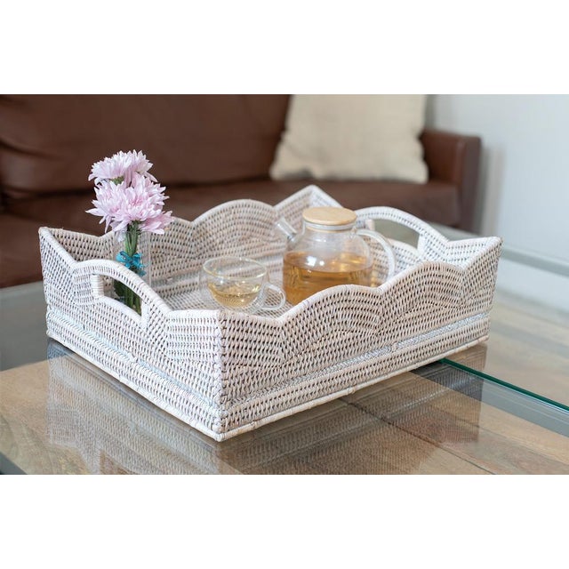 Keeping organized creates structure and allows you to work more efficiently. Our Scallop Collection rattan shelf and...