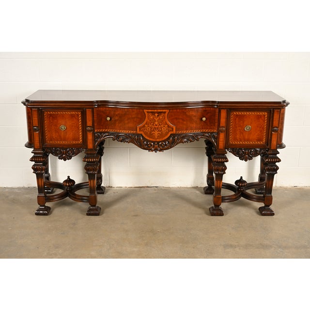 An exceptional antique Renaissance Revival or Baroque style sideboard, buffet, credenza, or bar cabinet By Rockford...