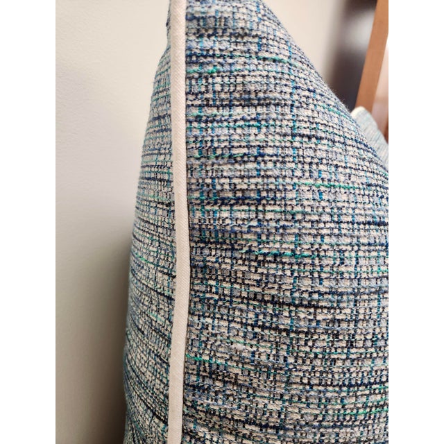 Elevate any space with this sophisticated 22" x 22" decorative pillow, crafted from Romo’s luxurious blue tweed-like...